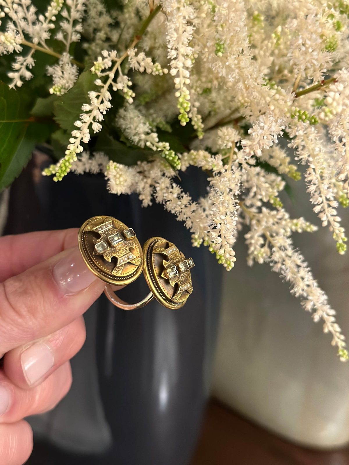 Gold earrings from the Harris Boulevard accessories collection